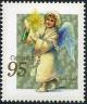 Colnect-209-945-Angel-with-candle.jpg