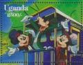 Colnect-6024-613-Mickey-Goofy-Minnie-waving-from-back-of-train.jpg