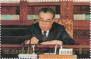Colnect-3256-131-President-Kim-II-Sung-at-desk.jpg