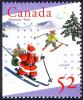 Colnect-2883-667-Santa-and-elf-Skiing.jpg