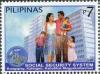 Colnect-2875-901-Family-in-front-of-SSS-Building.jpg