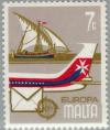 Colnect-130-707-Speronara-fishing-boat-and-Tail-of-Air-Malta-Airliner.jpg