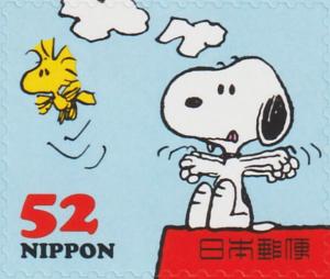Colnect-6262-774-Woodstock-Flying-near-Snoopy.jpg