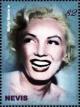 Colnect-5162-552-Marilyn-Monroe-laughing-and-looking-left.jpg