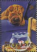 Colnect-4221-281-Dog-Looking-at-Fish-in-Bowl.jpg