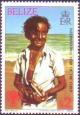 Colnect-731-811-Boy-holding-Cowrie-shell.jpg