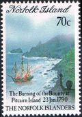 Colnect-2415-406-HMS--Bounty--on-fire-Pitcairn-Island-1790.jpg