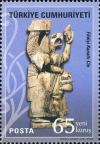 Colnect-950-749-Ivory-Winged-Genie.jpg