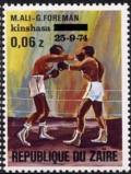 Colnect-1106-539-Boxing-match-George-Foreman-contra-Muhammad-Ali-black-over.jpg