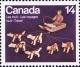 Colnect-755-165-Dogteam-and-Dogsled-ivory-sculpture-by-Abraham-Kingmeatook.jpg