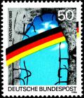 Colnect-5382-724-National-colours-spanning-breach-in-the-Berlin-Wall.jpg