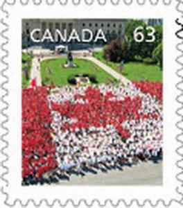 Colnect-2045-865-People-forming-maple-leaf-flag-Canada-Day-Winnipeg.jpg
