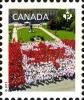 Colnect-2416-681-People-forming-maple-leaf-flag-Canada-Day-Winnipeg.jpg