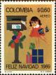 Colnect-3812-801-Child-posting-Christmas-card.jpg