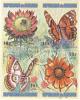 Colnect-2188-651-Strip-of-4-stamps-with-Flowers-and-Butterflies.jpg