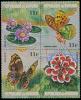 Colnect-2188-638-Strip-of-4-stamps-with-Flowers-and-Butterflies.jpg