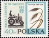 Colnect-4884-120-Tractor-and-wheat.jpg