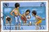 Colnect-1340-124-Children-playing-in-water.jpg