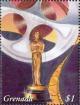 Colnect-4569-630-Film-reel-Oscar-statuette.jpg