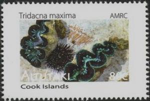 Colnect-3140-173-Maxima-Clam-Tridacna-maxima-and-sea-urchin.jpg