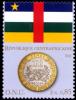 Colnect-2544-021-Flag-of-Central-African-Republic-and-100-franc-coin.jpg