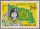 Colnect-2334-490-Girl-Scout-and-Flag.jpg