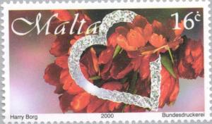 Colnect-131-390-Flowers-and-silver-heart.jpg
