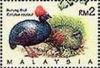 Colnect-2663-940-Crested-Partridge-Rollulus-roulroul.jpg