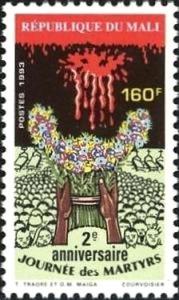 Colnect-2654-958-Heads-of-Martyrs-and-Bunch-of-Flowers.jpg