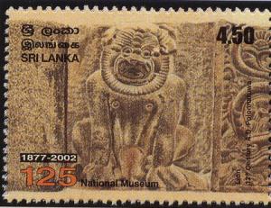 Colnect-2543-027-Carved-lion-sitting.jpg