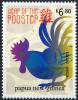 Colnect-4552-436-Rooster-feeding-facing-right.jpg