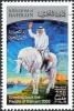 Colnect-1420-450-King-Hamad-bin-Isa-al-Khalifa-waving-on-a-horse.jpg