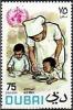 Colnect-2073-476-Nurse-feeding-children.jpg