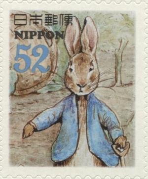 Colnect-3046-968-Peter-Holding-Shovel-Peter-Rabbit-Characters.jpg