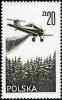 Colnect-2315-156-PZL-106-Kruk-crop-spraying-plane-w-o-distant-forest.jpg