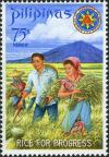 Colnect-2238-217-President-and-Mrs-Marcos-harvesting-miracle-rice.jpg