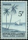 Colnect-537-242-Palm-trees-and-dhow-sailing-ship.jpg