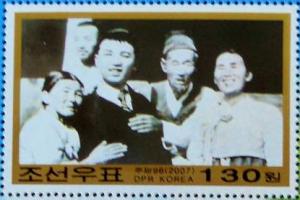 Colnect-3113-644-Kim-Il-Sung-as-a-teenager-with-his-family.jpg