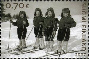 Colnect-586-616-2-Pairs-of-twin-boys-skiing.jpg