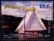 Colnect-5416-136-Canoes-with-Sail-Outrigger.jpg