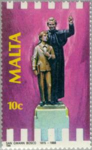 Colnect-130-968-St-John-Bosco-with-Youth-statue-Death-Centenary.jpg