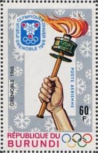 Colnect-2175-569-Hand-holding-the-Olympic-torch-the-emblem.jpg