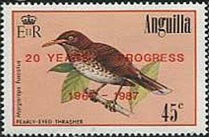 Colnect-1925-319-Pearly-eyed-Thrasher-Margarops-fuscatus.jpg