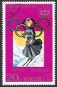 Colnect-1392-818-Woman-in-19th-century-costume-on-skis.jpg