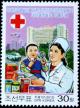 Colnect-2942-860-Nurse-with-child-hospital-drugs.jpg