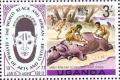 Colnect-1103-941-Prehistorical-tribe-skinning-a-hippopotamus.jpg