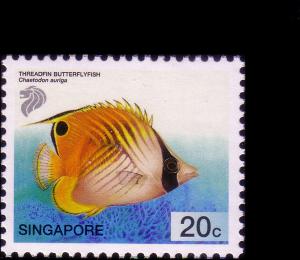 Colnect-2376-284-Threadfin-Butterflyfish-Chaetodon-auriga.jpg