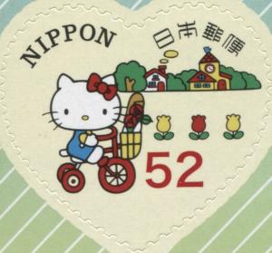 Colnect-3046-251-HELLO-KITTY-riding-the-tricycle.jpg
