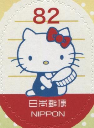 Colnect-3046-284-HELLO-KITTY-holding-a-hairbrush.jpg