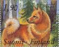 Colnect-160-014-Finnish-Spitz-Canis-lupus-familiaris.jpg